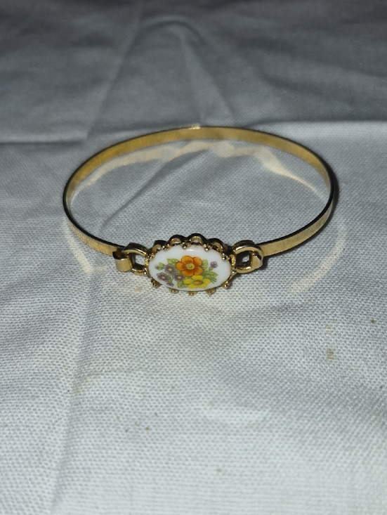 Avon Jewelry - Avon Gold-Tone Bangle with Orange Floral Porcelain Medallion